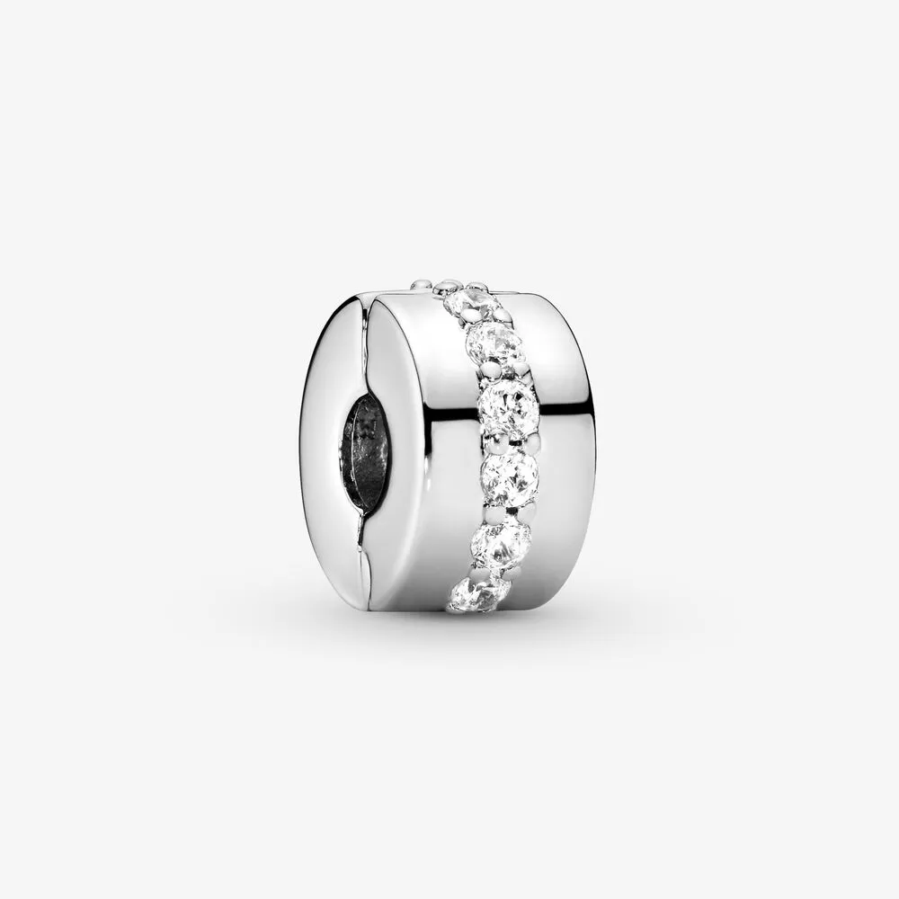Pandora Moments clip charms help you to evenly space out your charms, bringing both balance and beauty to bracelets. This one is made from sterling silver, accented with a line of cubic zirconia that runs around its middle. Add a single piece to a styling
